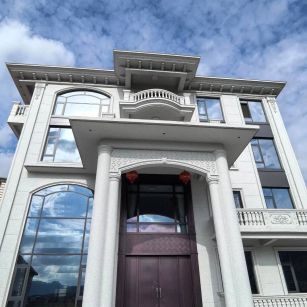 四平白麻别墅外墙干挂石材效果示例