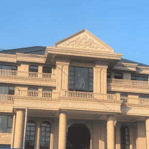 四平黄金麻别墅外墙干挂石材效果示例