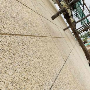 四平 黄金麻花岗岩荔枝面外墙干挂石材效果示例