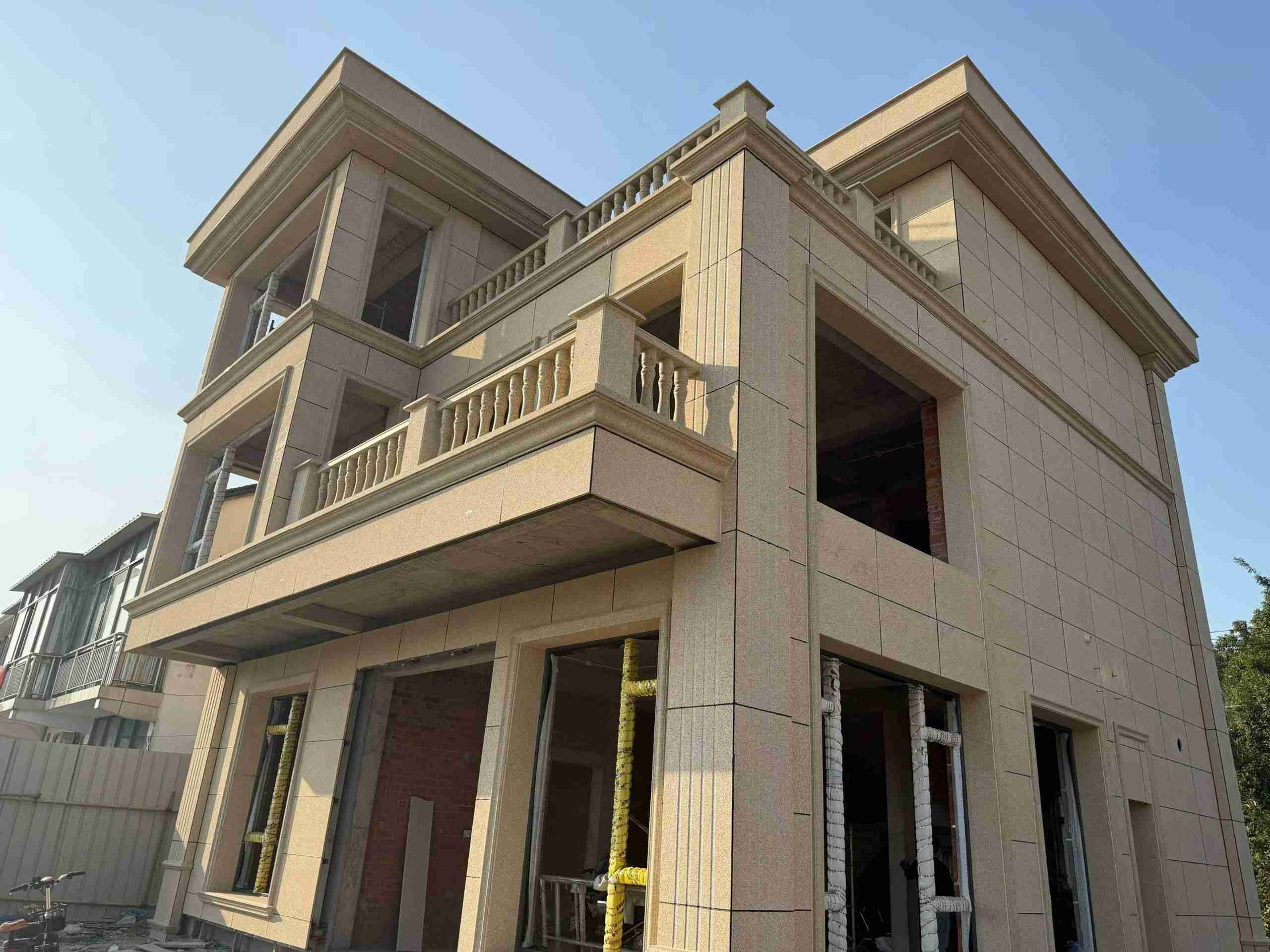 四平 黄金麻花岗岩石材荔枝面外墙干挂效果展示